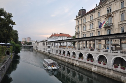 21 Tour Boat on the Ljubljanica River with the market on the back right